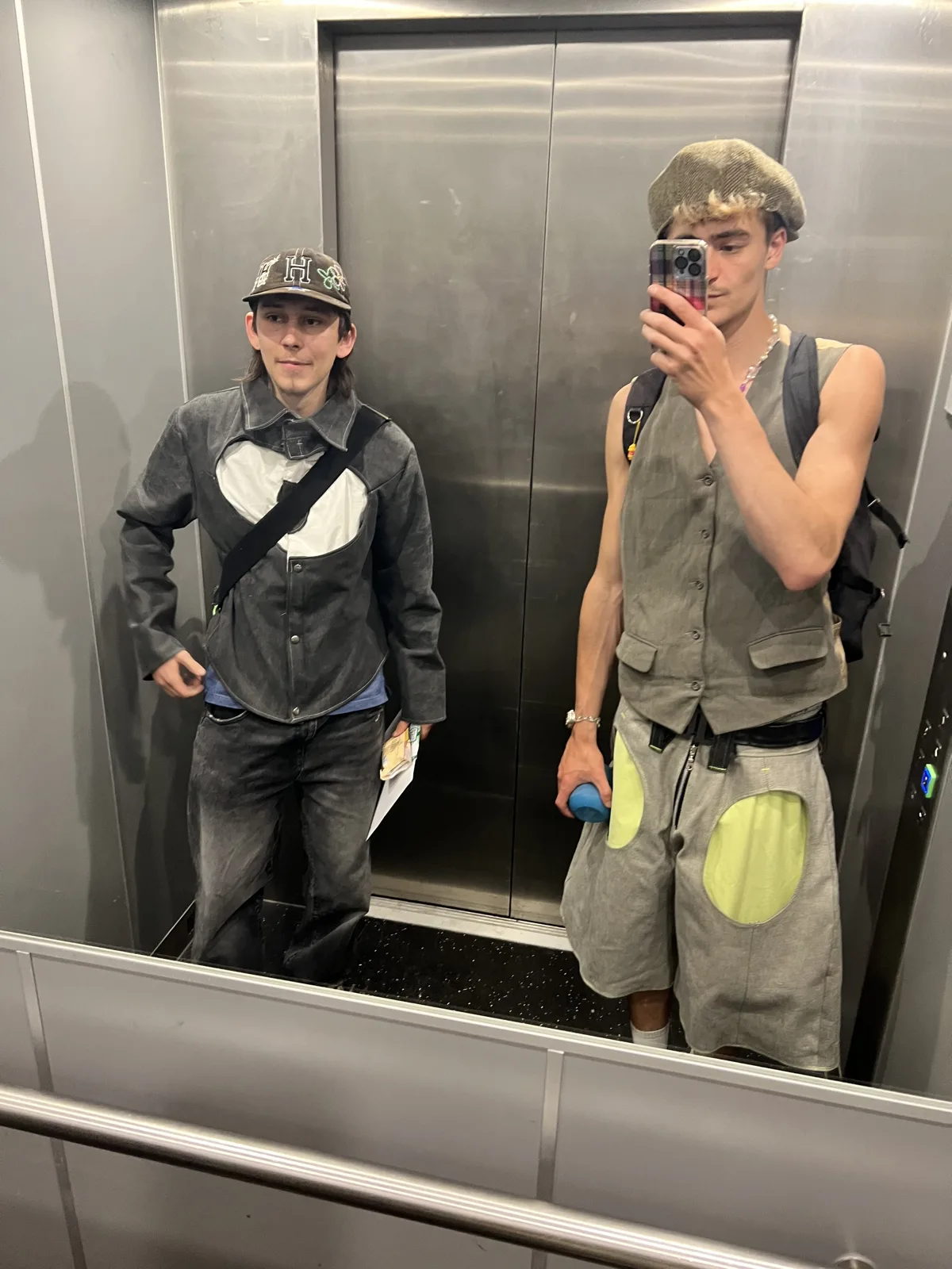 Two of us in a mirror, wearing our own pieces
